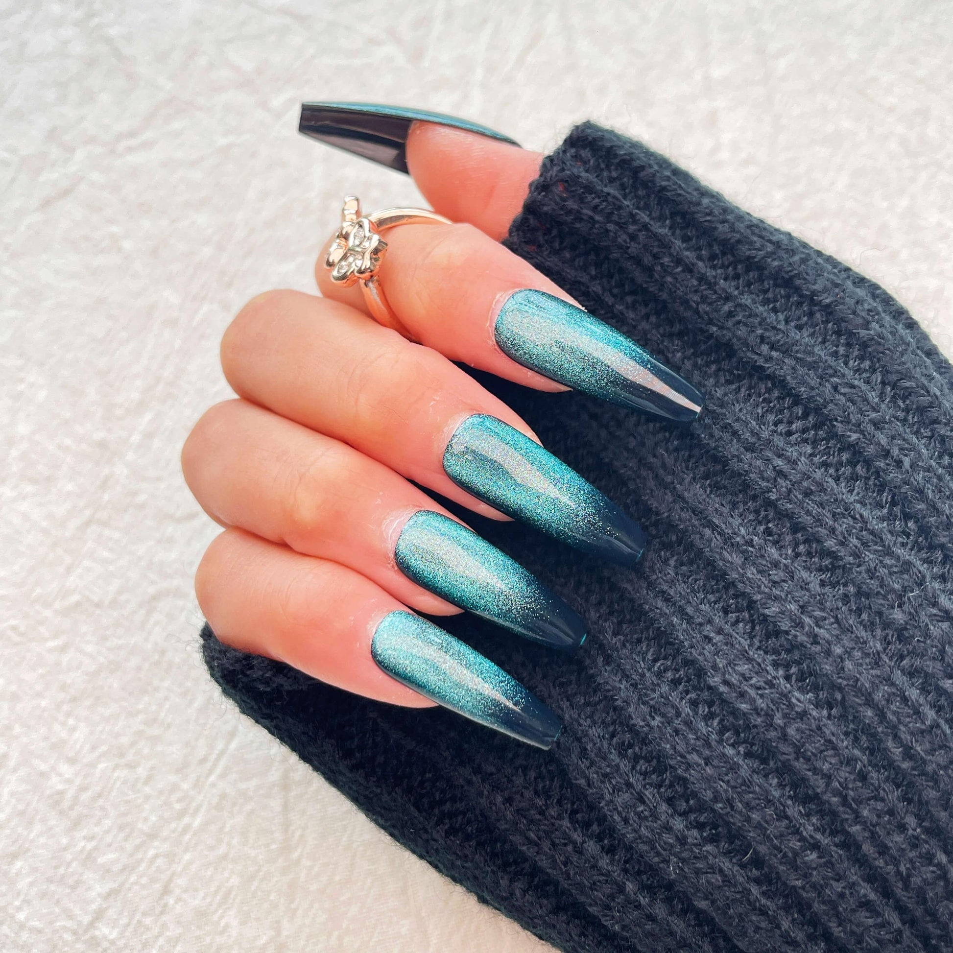 teal and black acrylic nails
